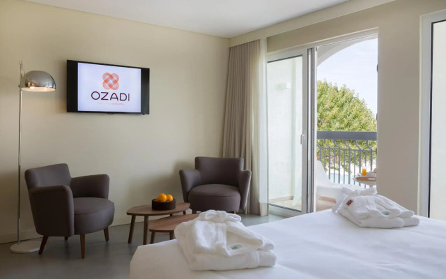 Ozadi Tavira Hotel