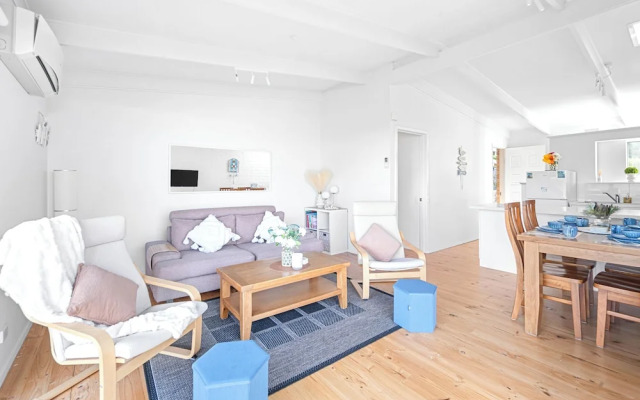 Sandy Toes and Salty Kisses