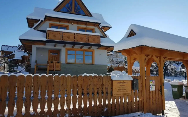 Domek za Strugiem - pokoje i apartamenty