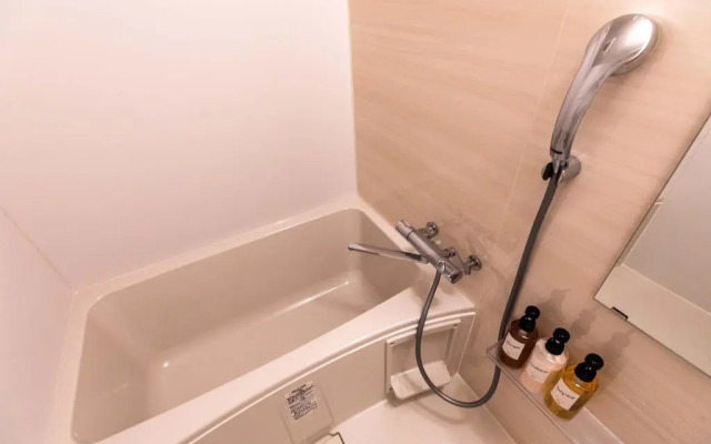 Mr.KINJO in front of Manza Beach