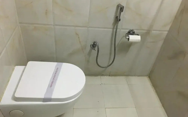 JK Rooms 101 Hotel Asian Inn