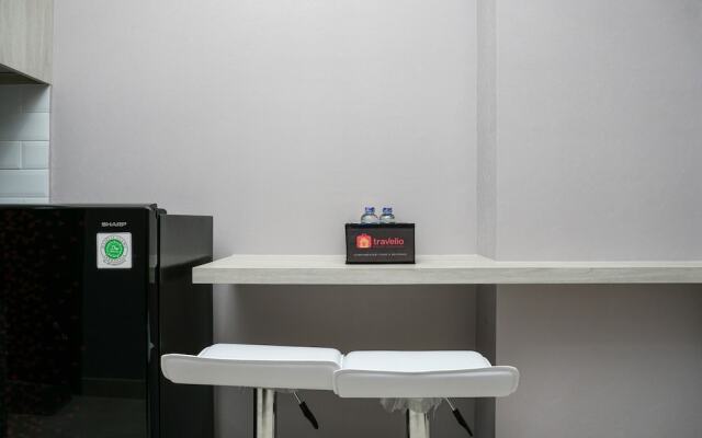 Cozy 1BR at Puri Orchard Apartment