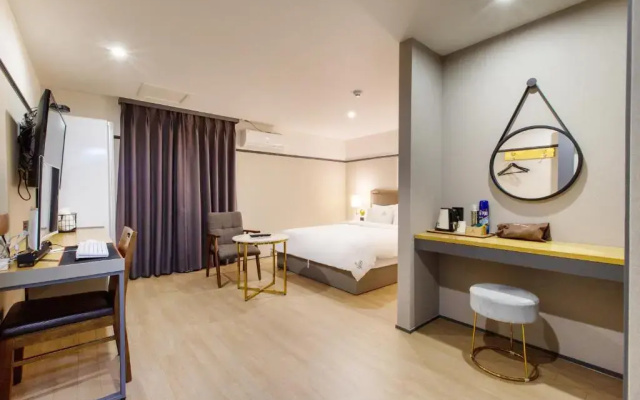 Brown Dot Hotel Minam