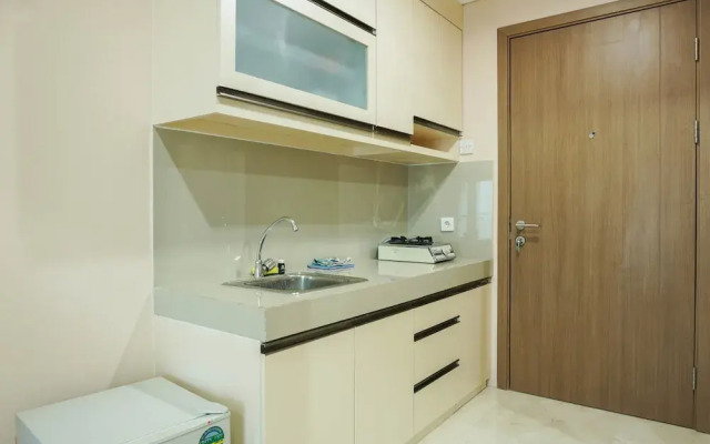 Modern 1BR Apartment at Puri Orchard