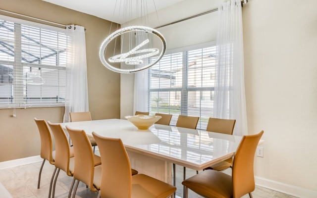 Elegant home with themed bedrooms near Disney