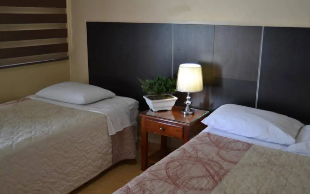 Urdesa Suites Hotel