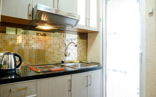 Furnished Studio with Comfortable Design Green Pramuka Apartment