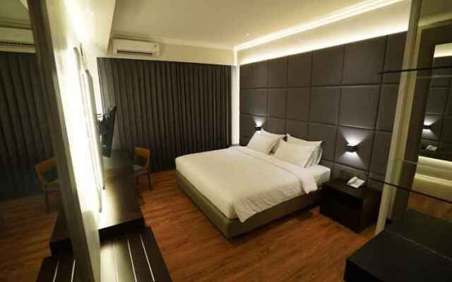 De Lobby Suite Hotel