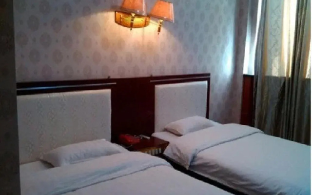 Luo Chuan Guo Hao Business Inn