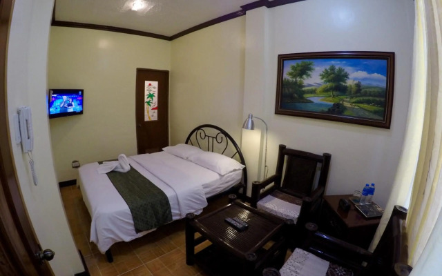 The Executive Villa Inn & Suites
