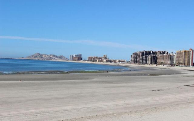 Las Gaviotas 2BR 402 by Casago