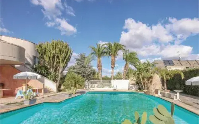 Four Bedroom Holiday Home in Vittoria