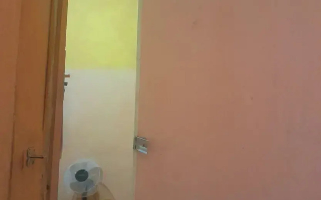 SPOT ON 93852 Fermansio Homestay 2