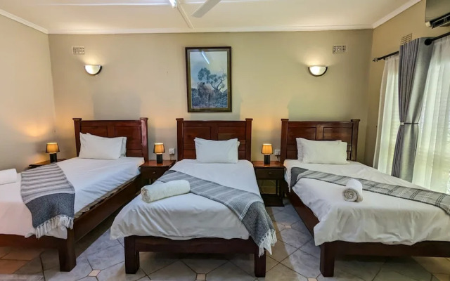 "room in Lodge - Zambezi Family Lodge - Rhino Room"