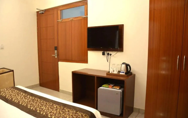 FabHotel Roselle Inn