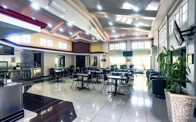 Prado Inn & Suites