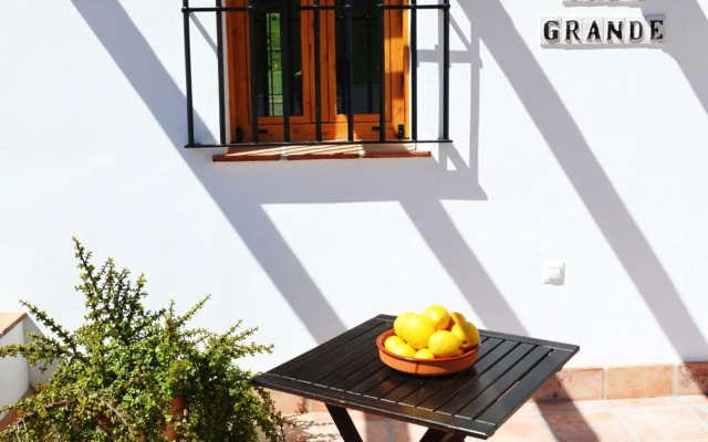 Casa Grande / Rosas Cantares