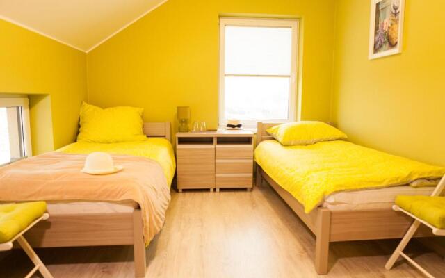 "U Mamy Róży" - Pokoje Gościnne