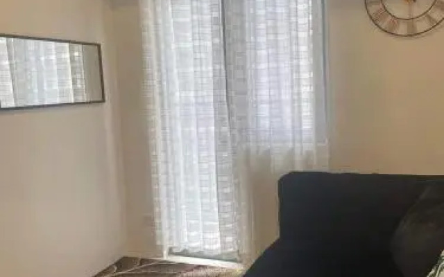 Cozy 1BR with balcony at Fame Residences