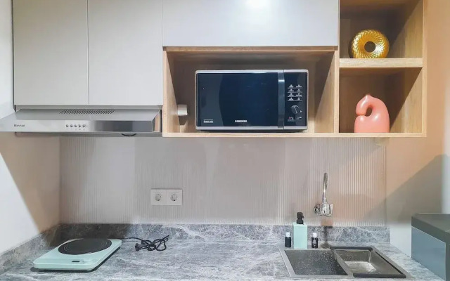 Comfort Stay 1BR at Patraland Amarta Apartment