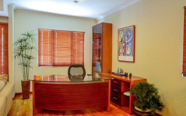 1 Bedroom at Puri Garden Apartment by Travelio