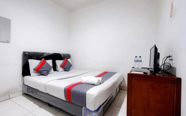 Super OYO 91535 J&b Rooms Tomang