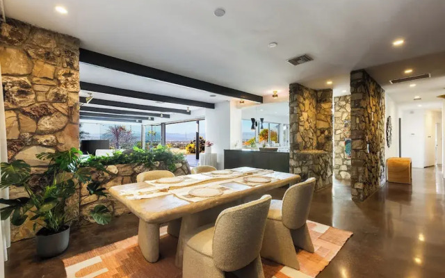 Stylish Hillside Retreat with Pool & Views