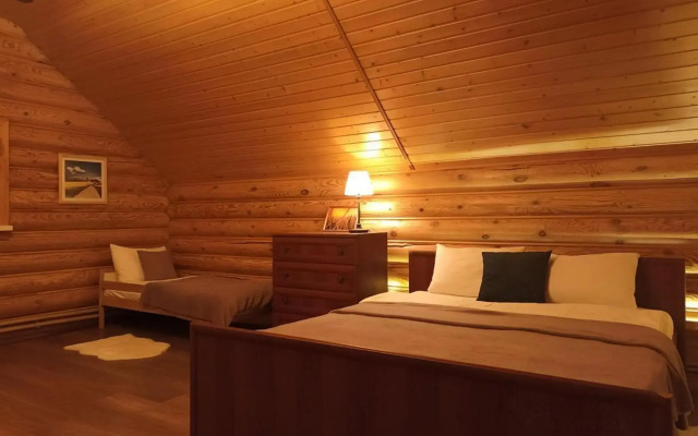 Log house with a Russian wood-burning sauna