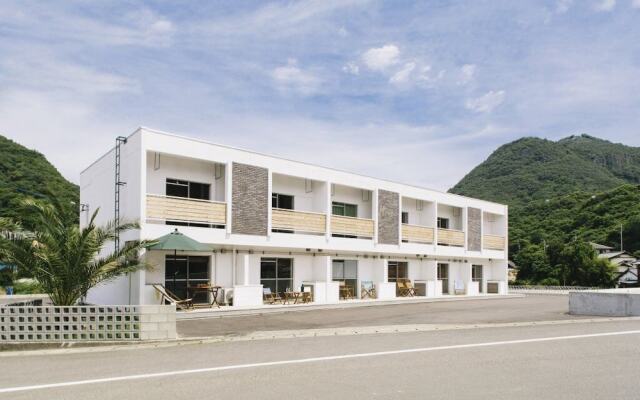 Ariake Palm Tree House by Toma Rutto