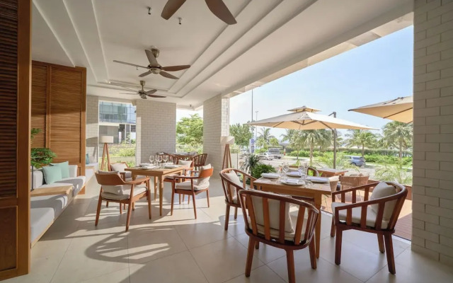 Signature By M Village Beachfront Hotel