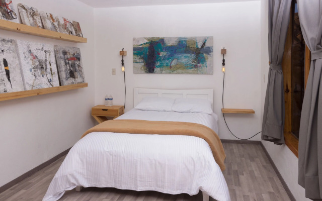 La Tozi Galería Hotel