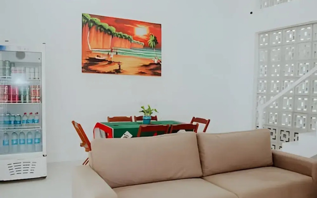 Família Pansini - Sua Casa na Pipa