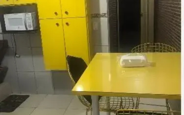 Casa com piscina próxima à cachoeira