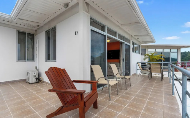 Modern Top-Floor Condo with Panoramic Views and Community Pool