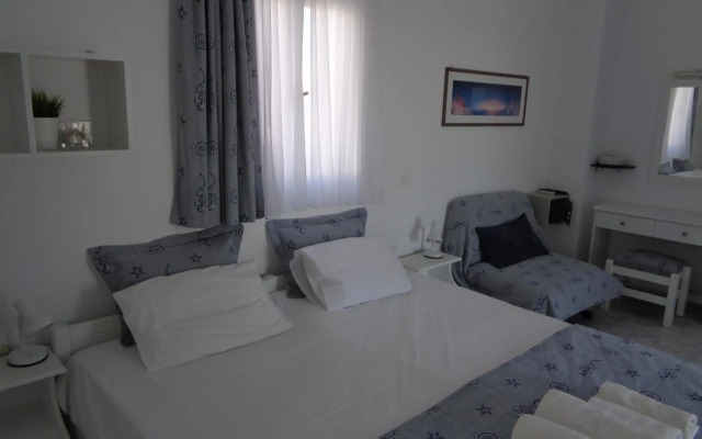 Blue and White Studios & Apartments