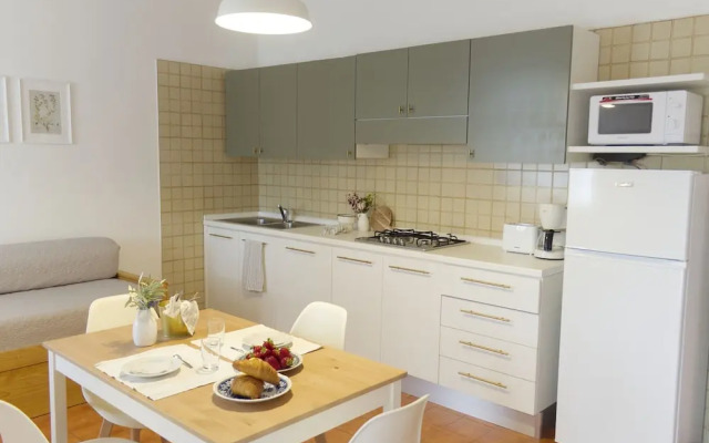 Belvilla by OYO Comfortable Apartment With Pool