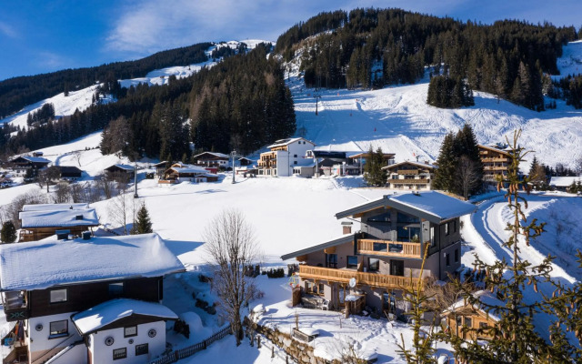 Ski in - Ski out Panoramaferienhaus Breitmoos neben Mittelstation