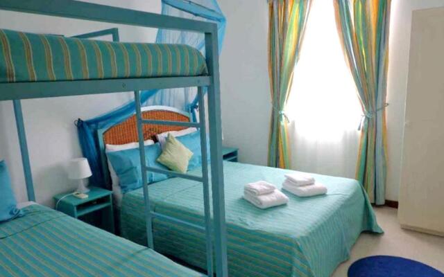 3 bedrooms appartement at Grand Baie 300 m away from the beach with shared pool enclosed garden and wifi