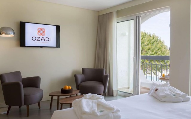 Ozadi Tavira Hotel