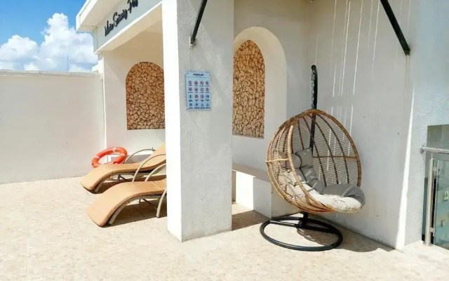 Luxurious Nairobi Condo With Rooftop Pool & Gym