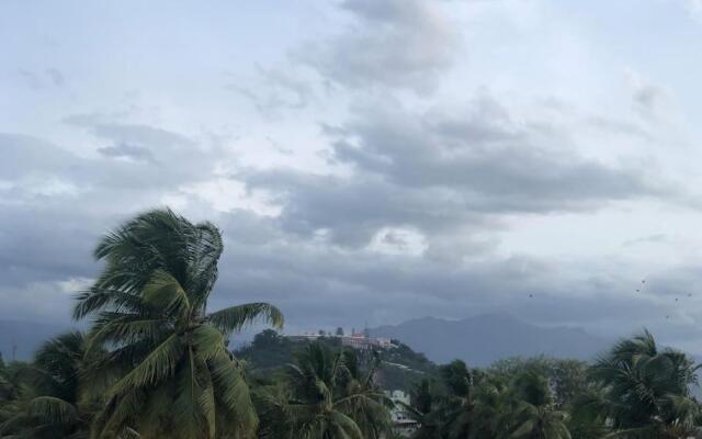 House With Hill Temple View