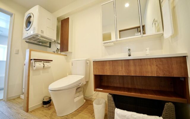 Coral Palace Onna by Sunset Avenue