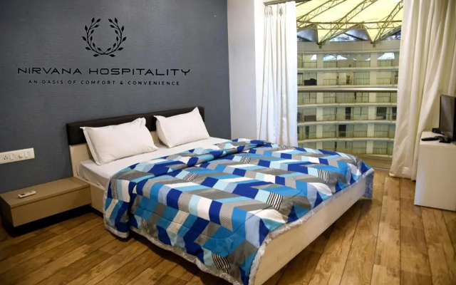 Luxurious Studio Homes Nr Surat Airport by Nirvana Hospitality