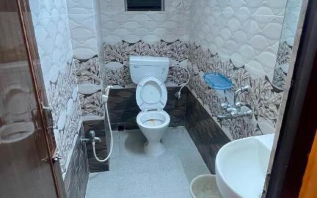 OYO R Guest House Near Netaji Subhash Chandra Bose International Airport