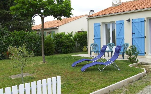 Une sympathique maison de vacances aux volets bleus