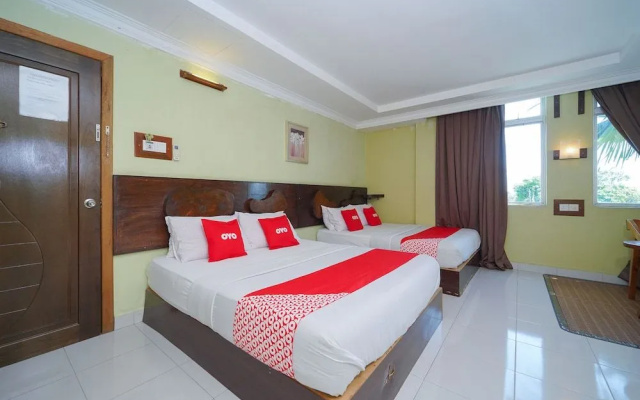 OYO 89976 Fins Hotel
