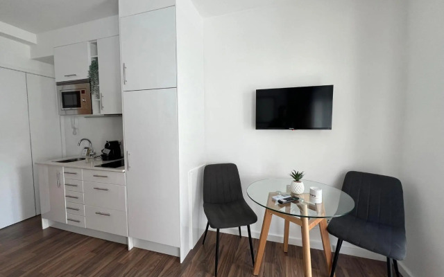 Almada Studios & Suites