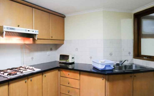 Homey and Extra Spacious 2BR at Kondominium Puncak Marina Apartment By Travelio – Kitchen – Surabaya