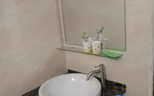 Jujiaodian Apartment