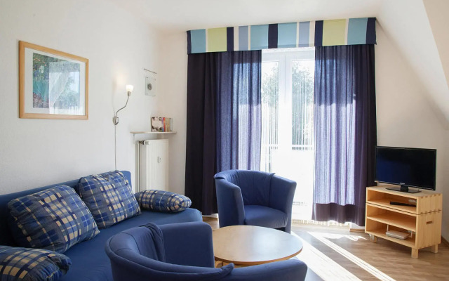 Apartment in Burhave with a shared pool